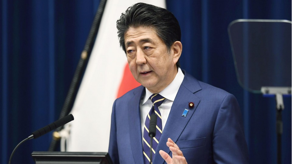 Calls grow for Japan PM to declare state of emergency over virus