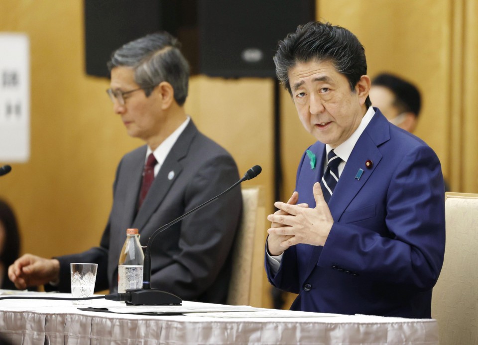WHO reform needed but Japan has no plan to cut funding: Abe